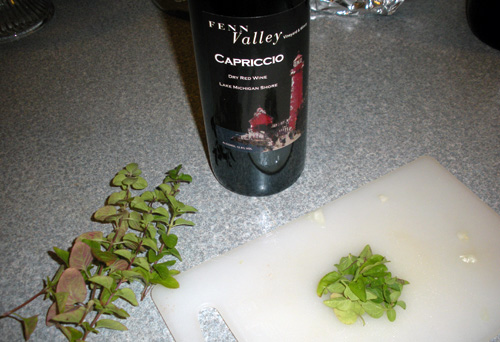 Add fresh basil and red wine